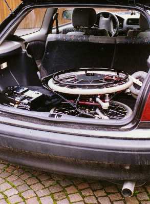 folded wheel-chair in car